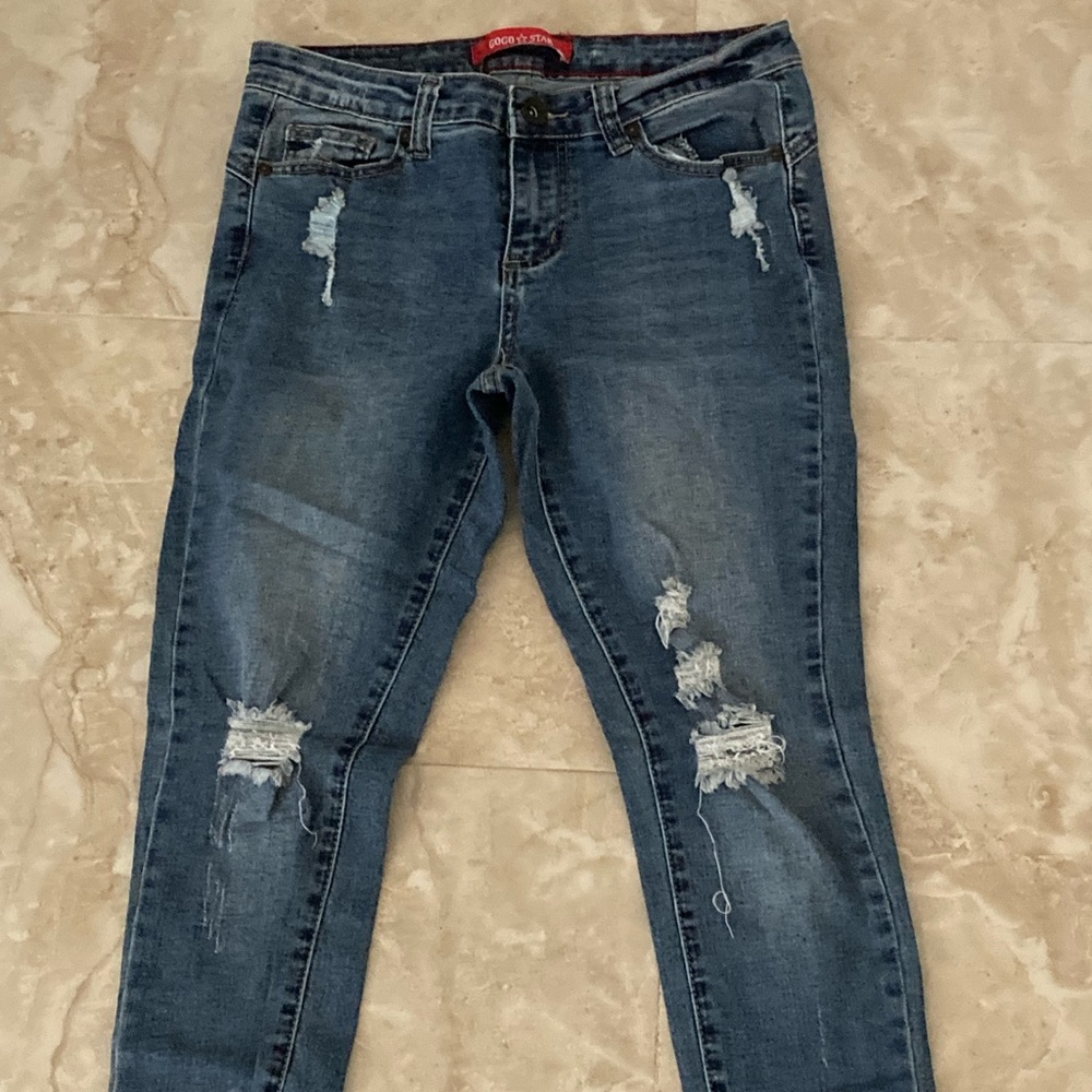 Blue ripped skinny jeans